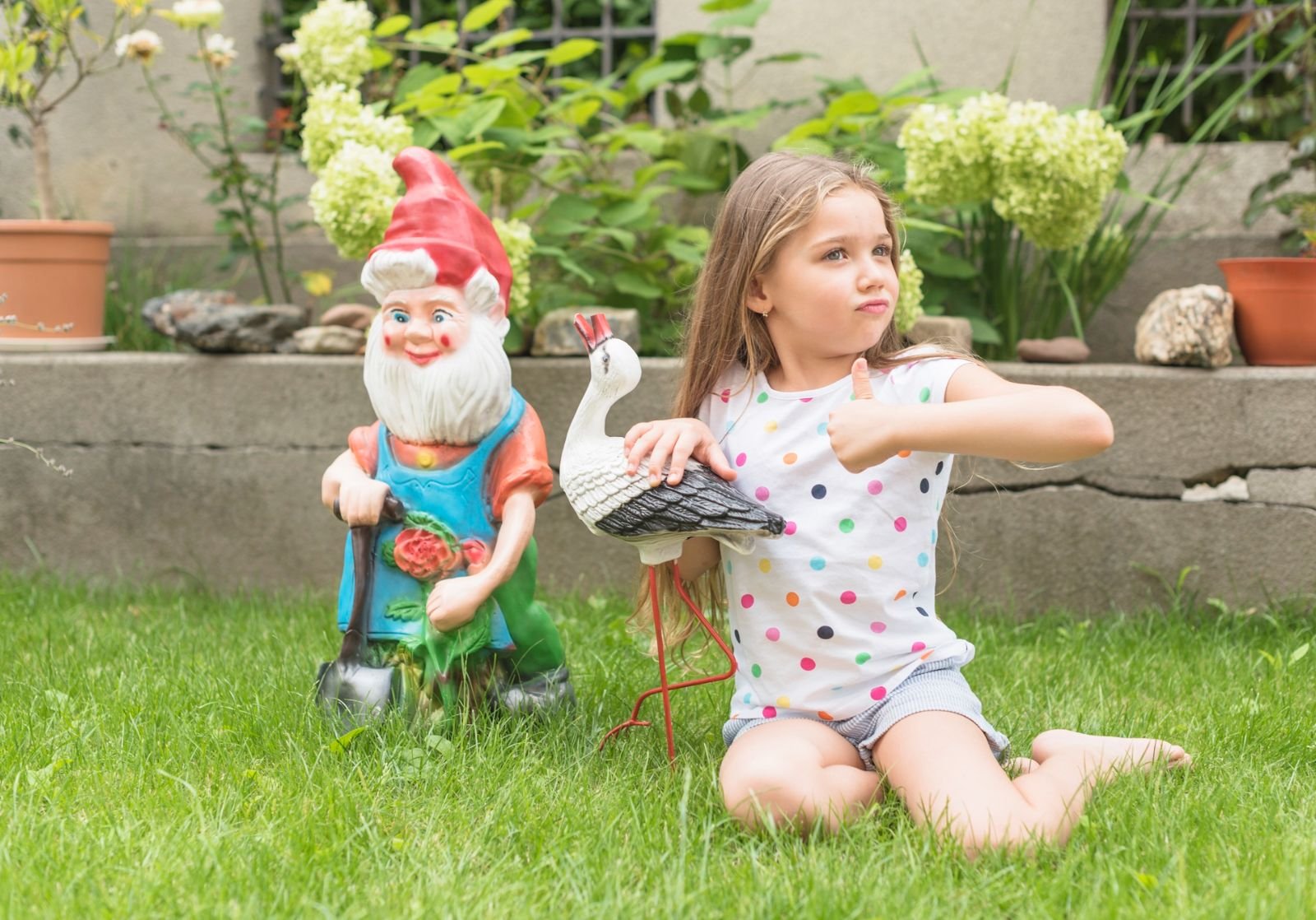 how to make a kid friendly garden filled with colorful flowers, safe play areas, and fun activities for children